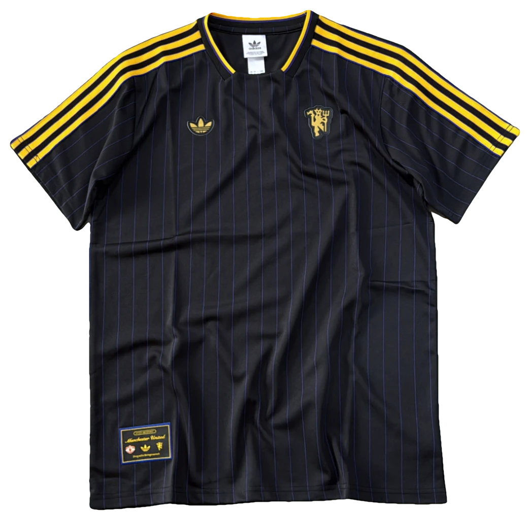 Camisa Manchester United Icon preta e dourada, frente